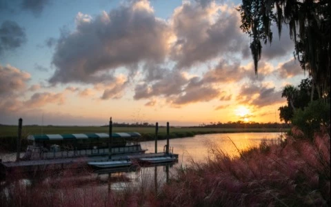 dock in sunset landscape of a river