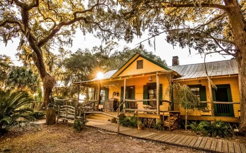 exterior view of a yellow lodge 