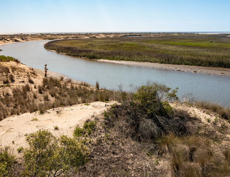 fisherman at creek