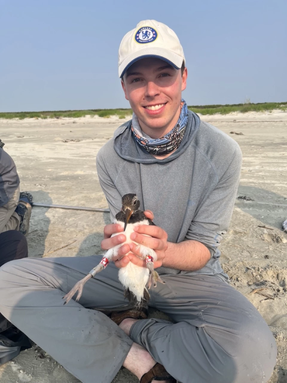 a man holding a bird
