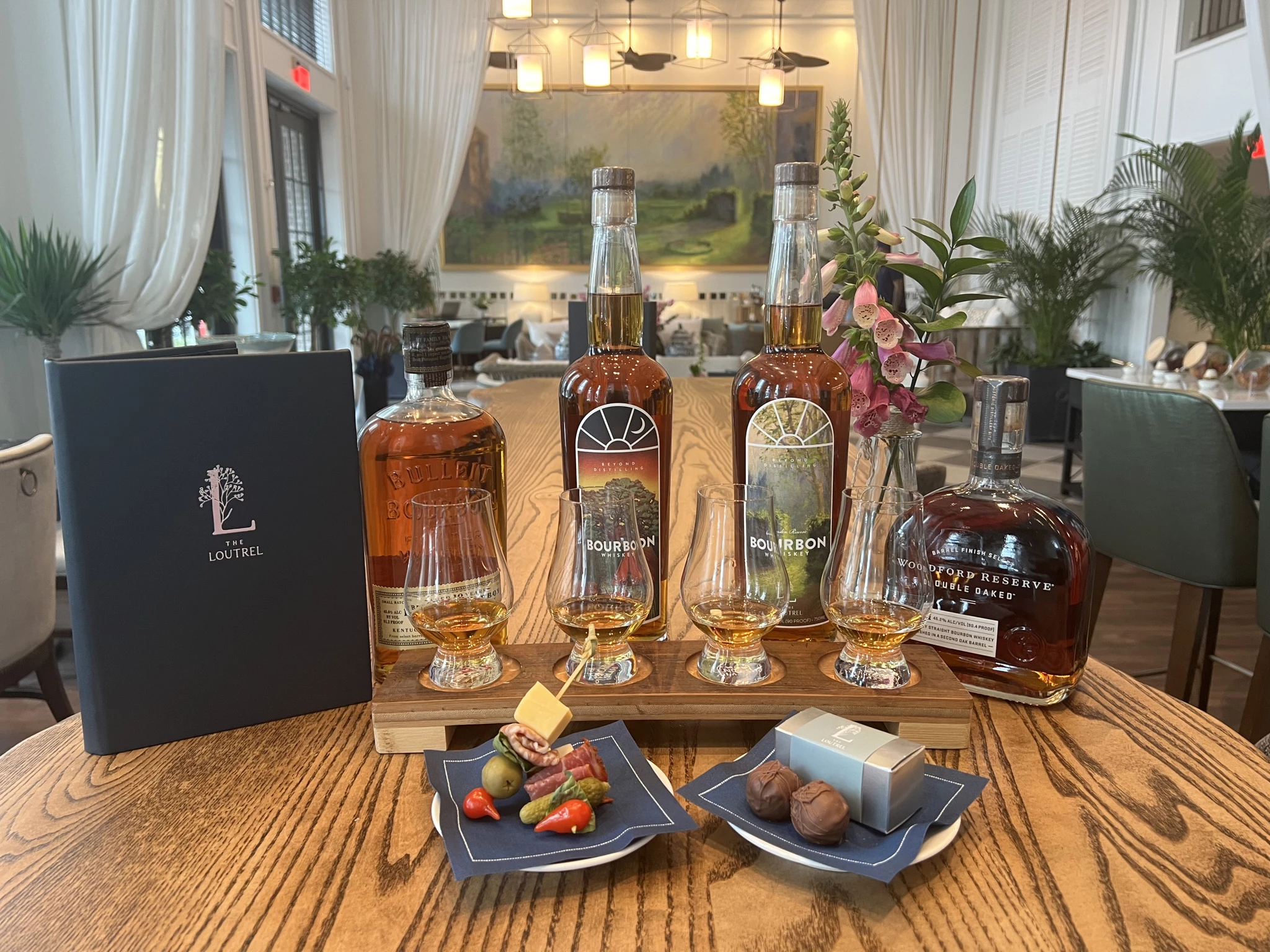 a group of bottles of alcohol on a table