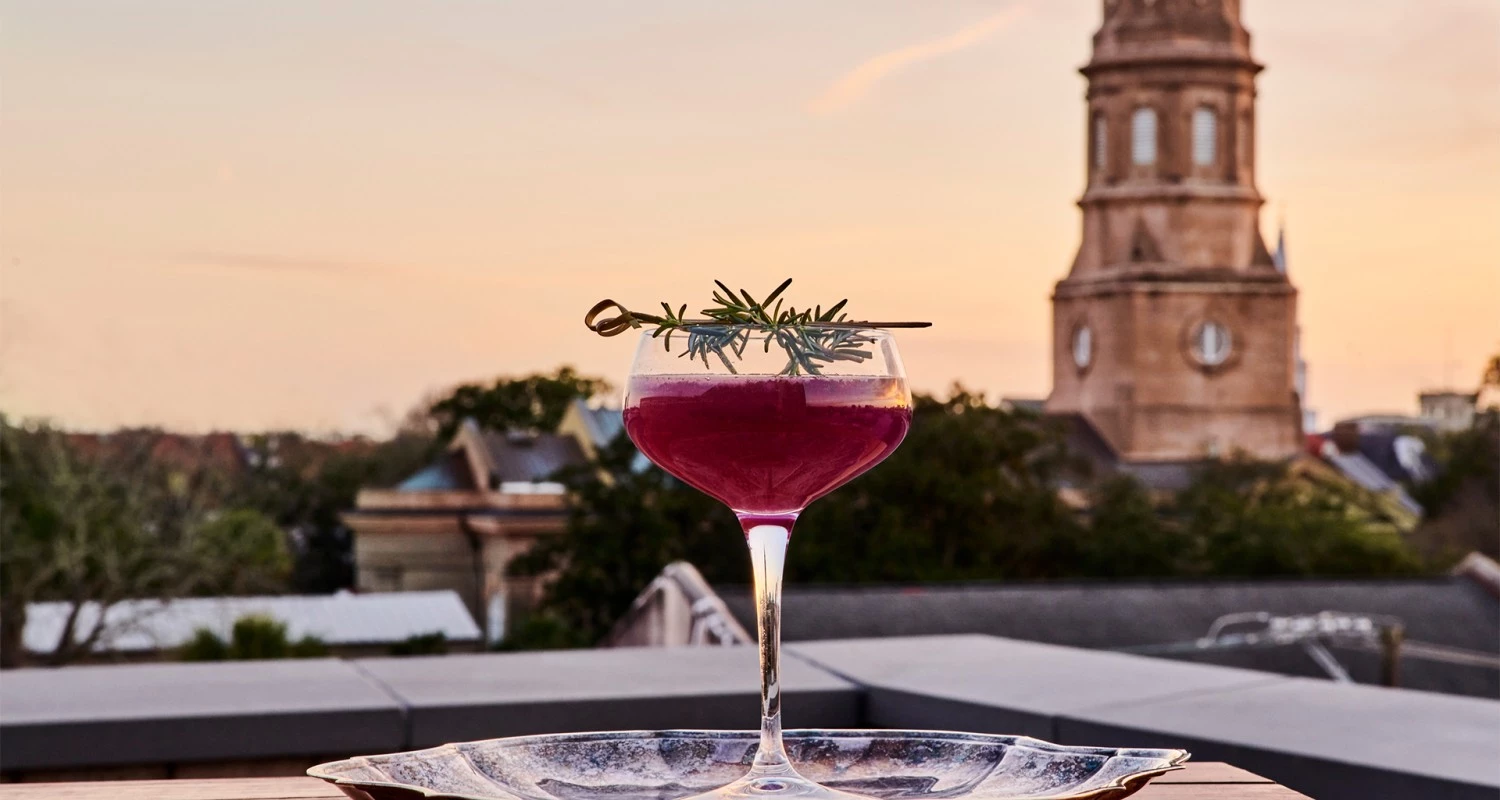 a glass with a drink on a plate gallery 2