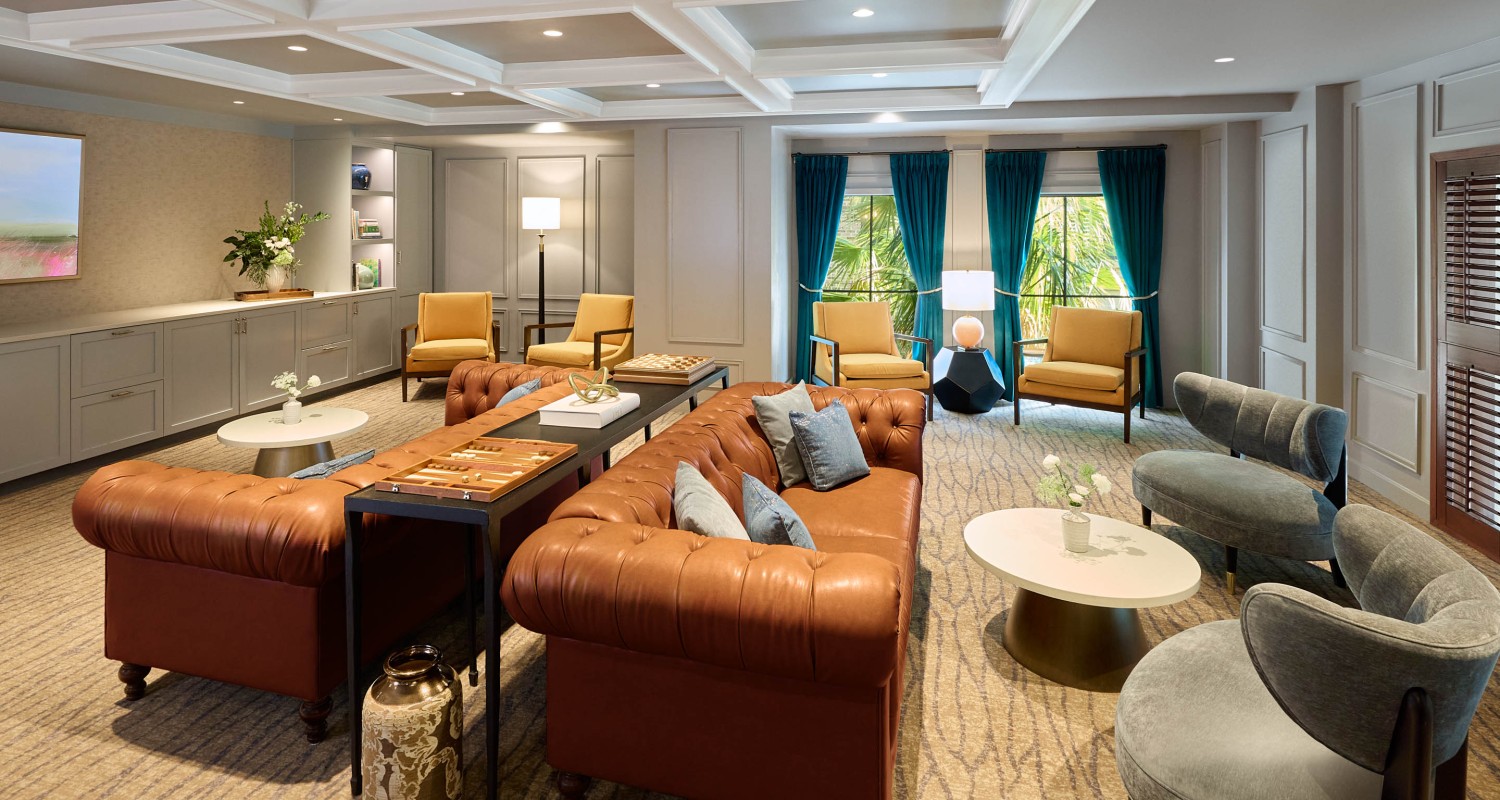 a room with couches and chairs