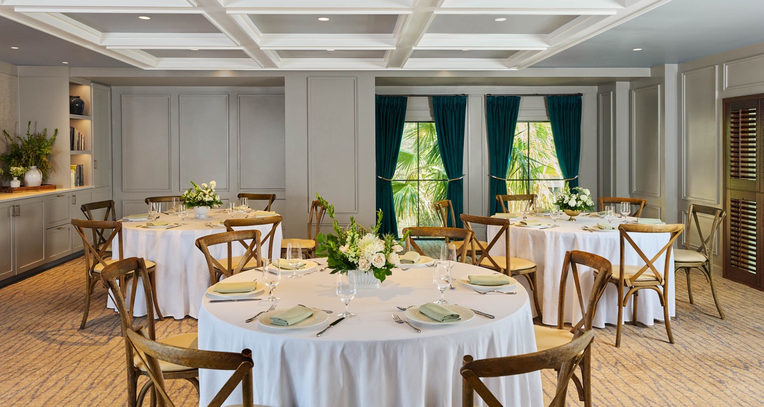 a room with tables and chairs