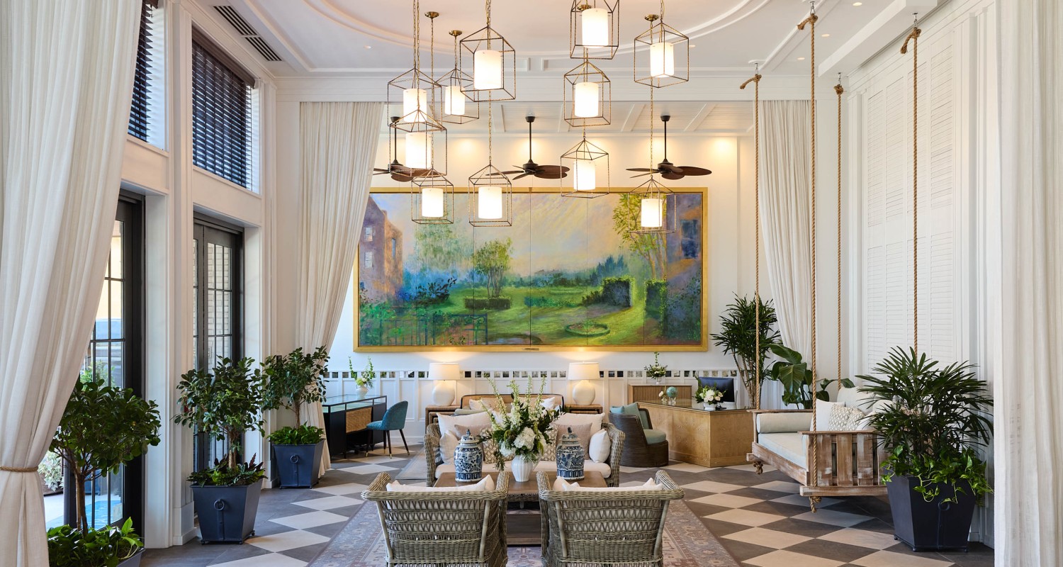 a room with a checkered floor and a large painting on the wall