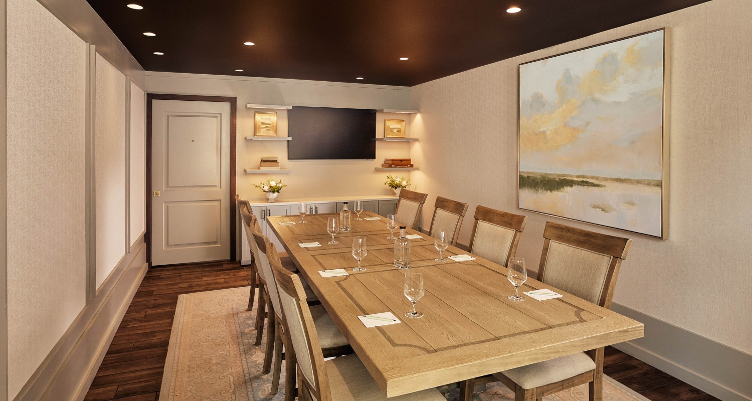 a room with a table and chairs