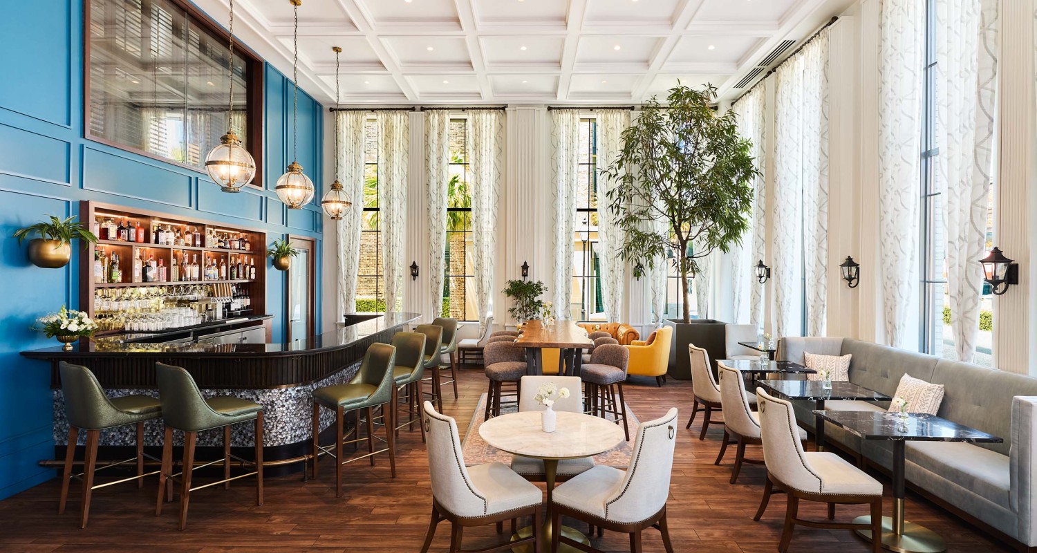 a room with tables and chairs