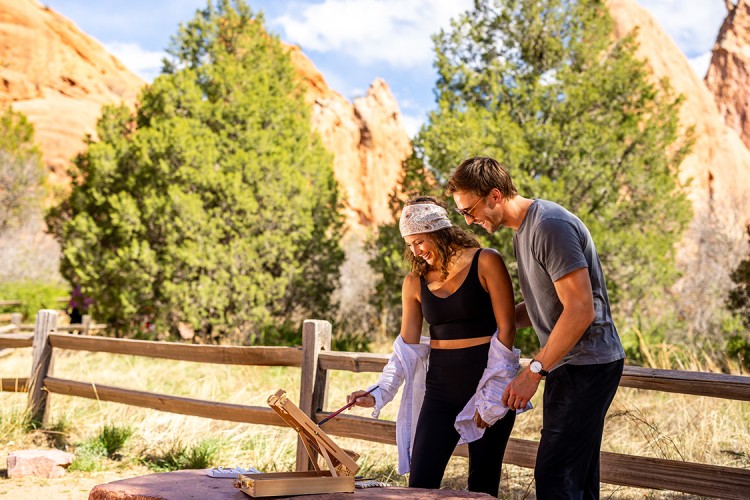 a man and woman standing next to each other