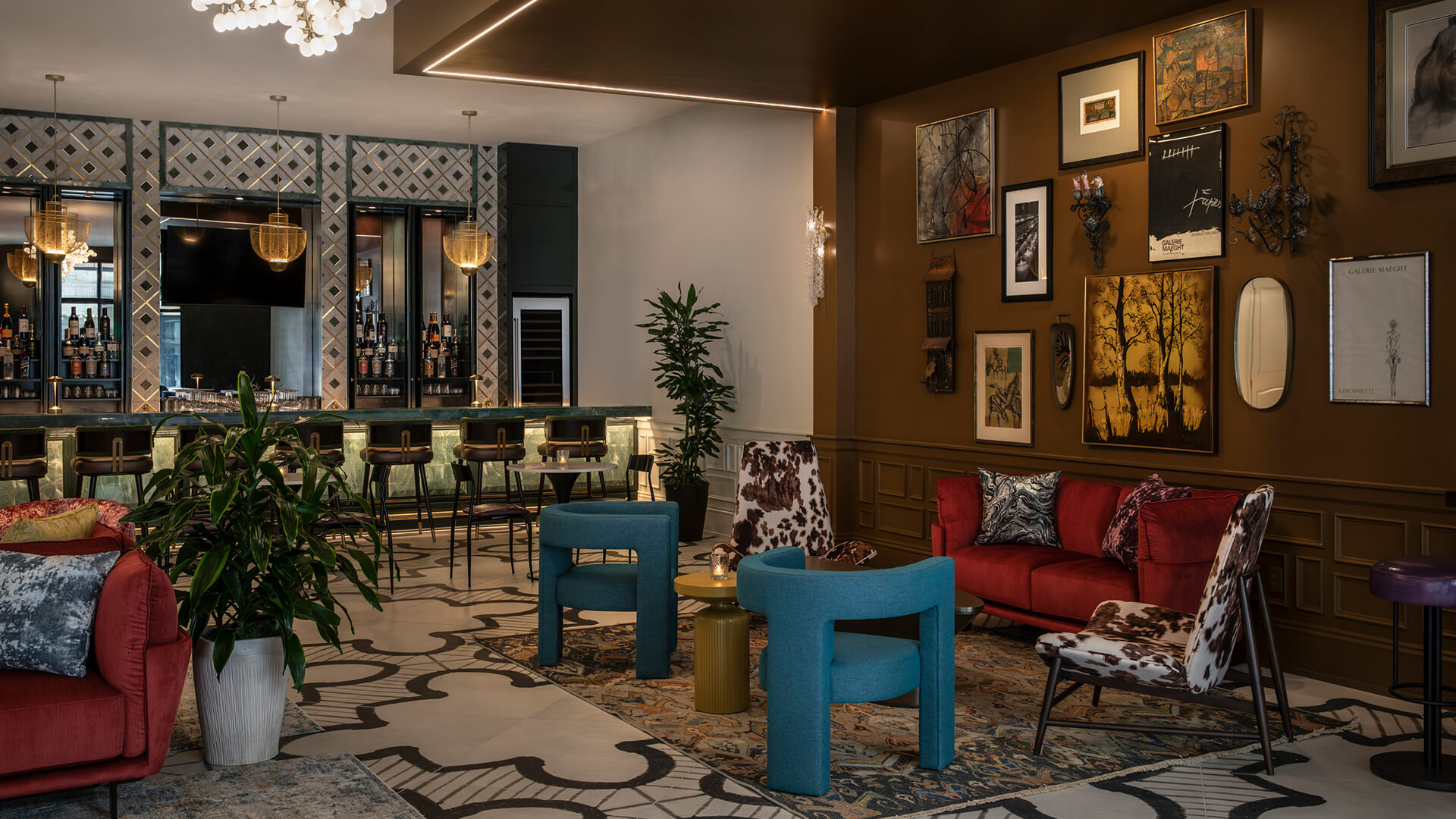 a room with a bar and chairs