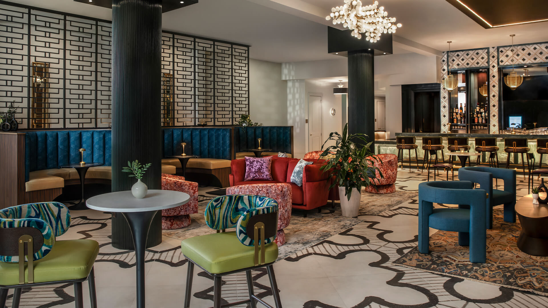 a room with colorful chairs and tables