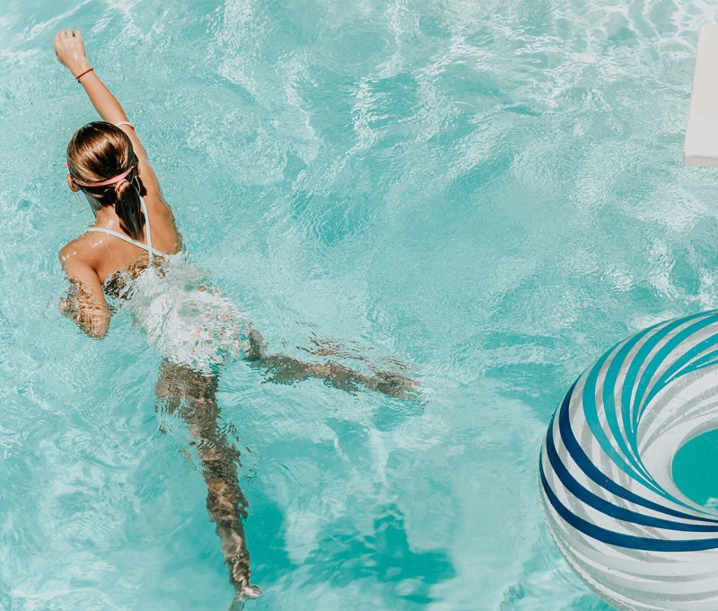 a person in a pool