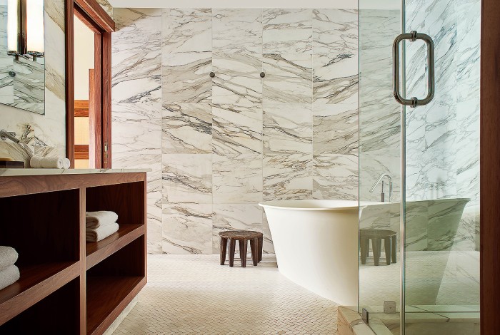 a bathroom with a large mirror