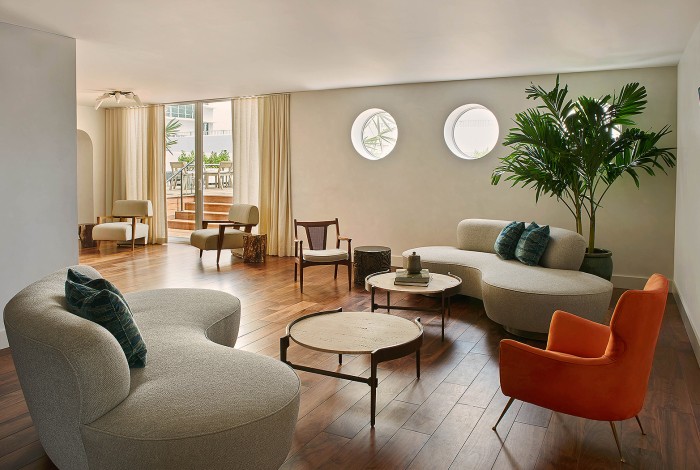 a living room with a couch and a table