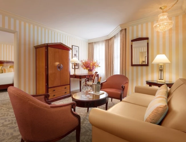 a room with striped walls and a couch