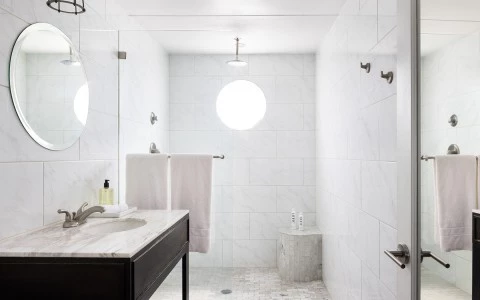 a bathroom with a sink and a mirror