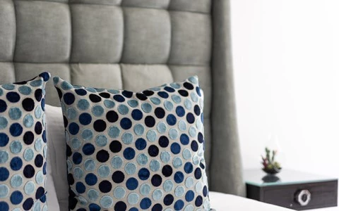 a couch with a lamp on it