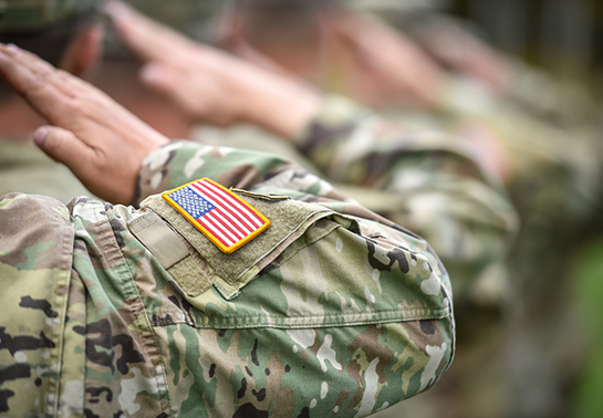 a close up of a flag patch on a military uniform