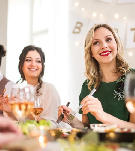 a group of people sitting at a table
