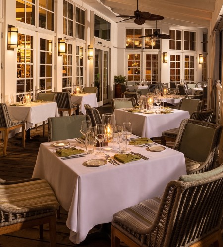 a restaurant with tables and chairs