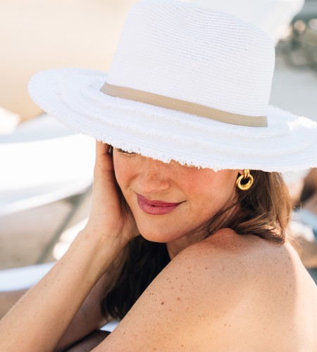 a woman wearing a hat
