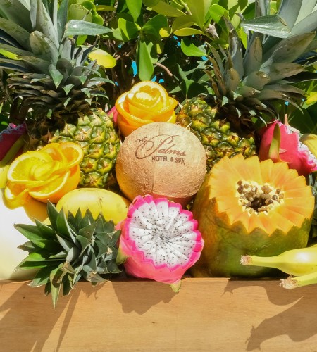 a box of fruit and flowers