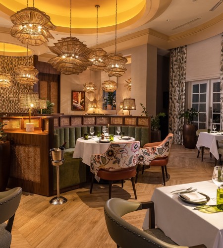 a restaurant with tables and chairs