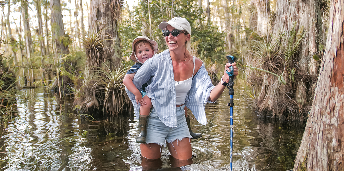a woman and child in water