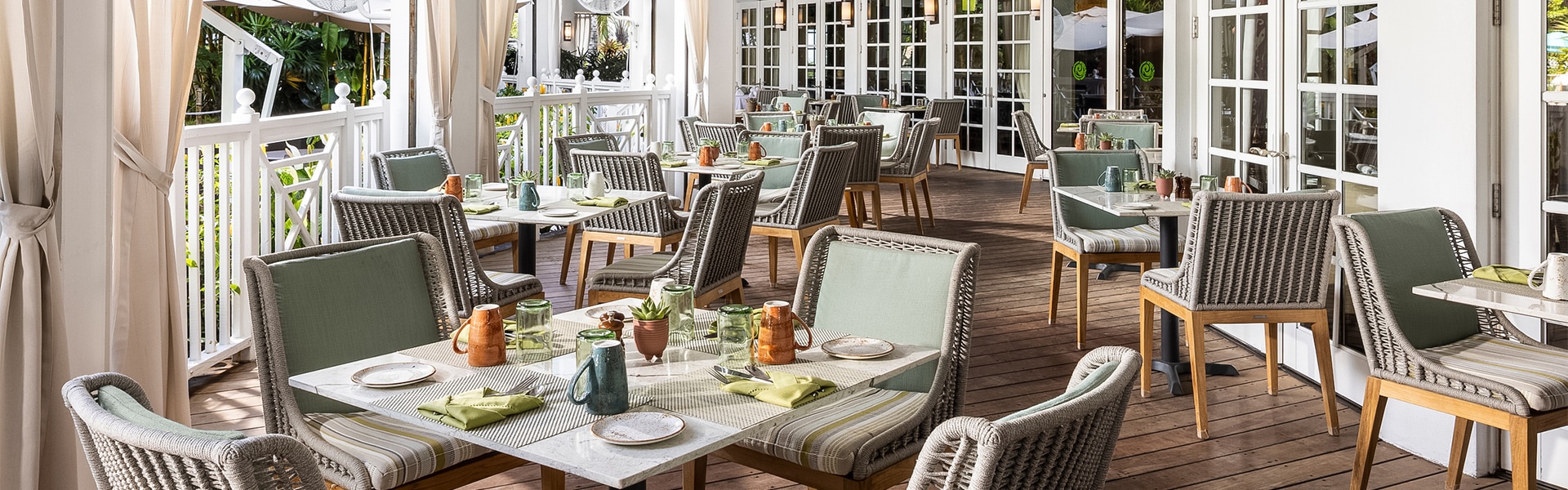 a restaurant with tables and chairs