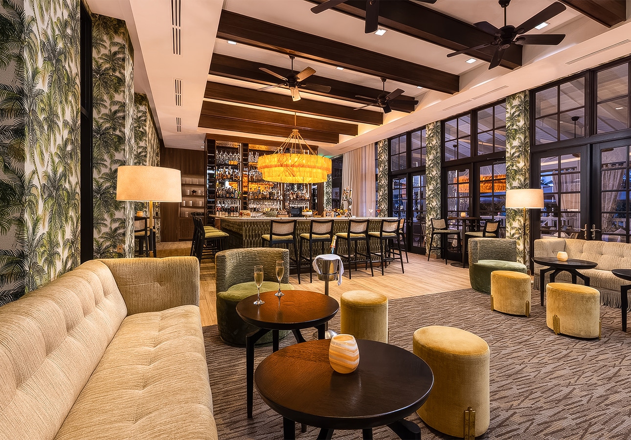 a room with a bar and a couch