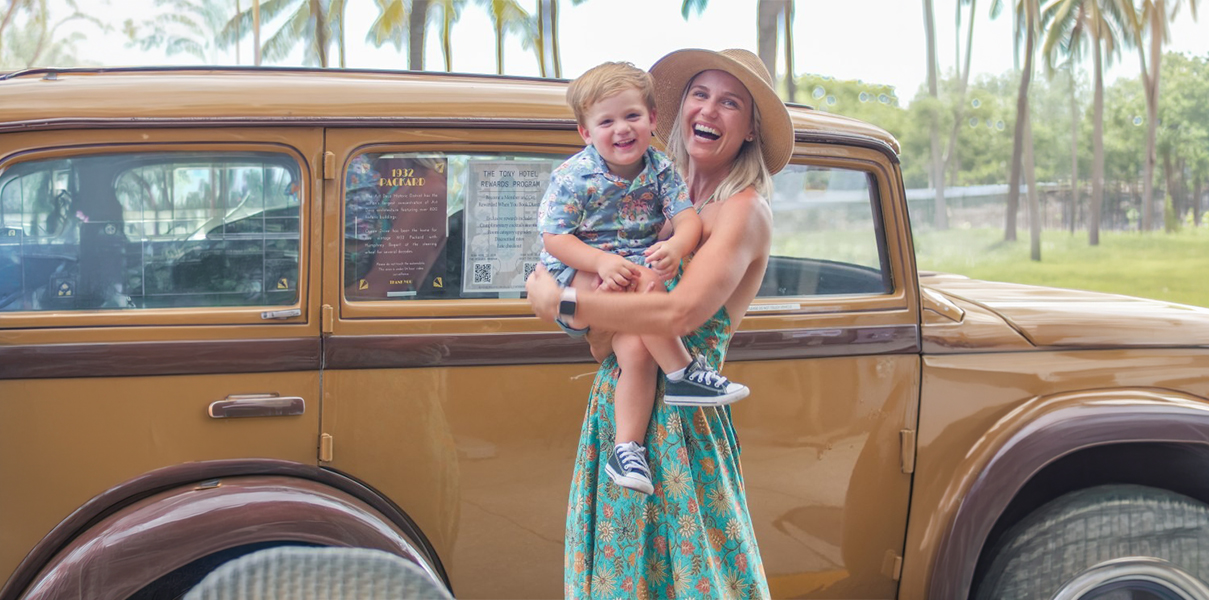 a woman holding a child in her arms