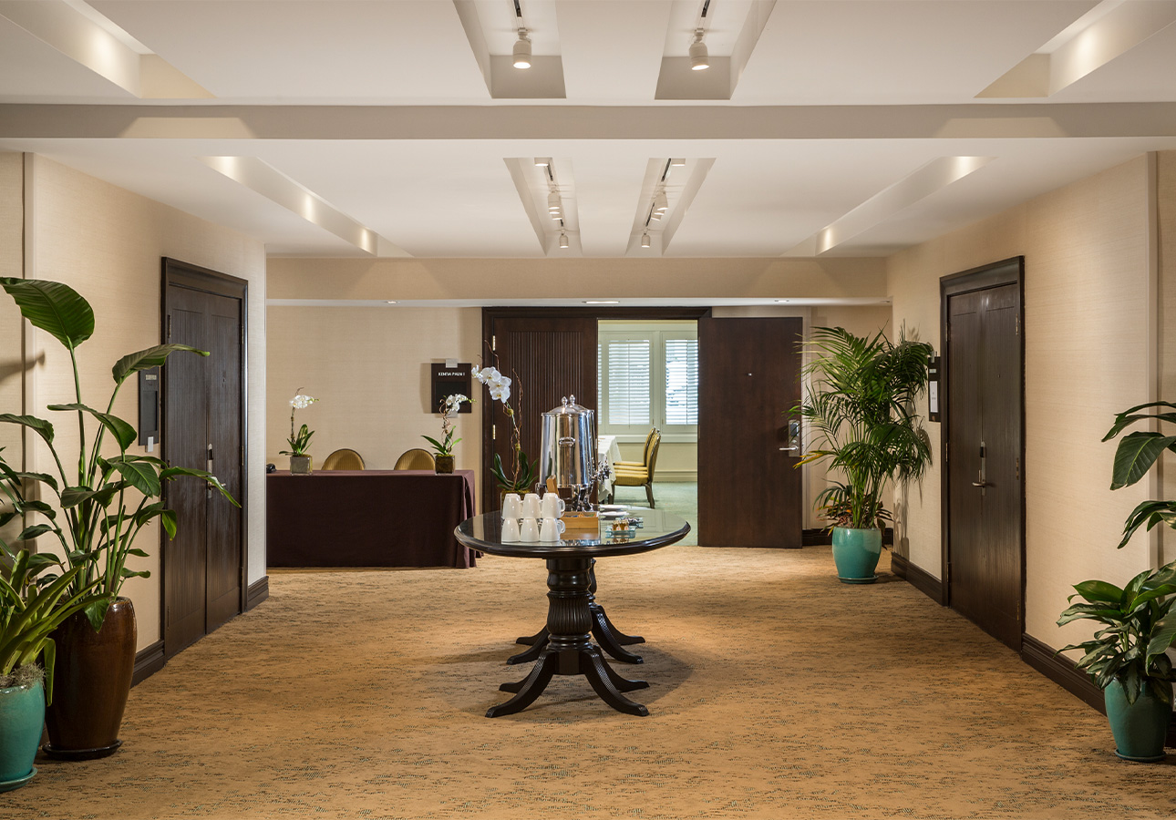 a room with a table and chairs