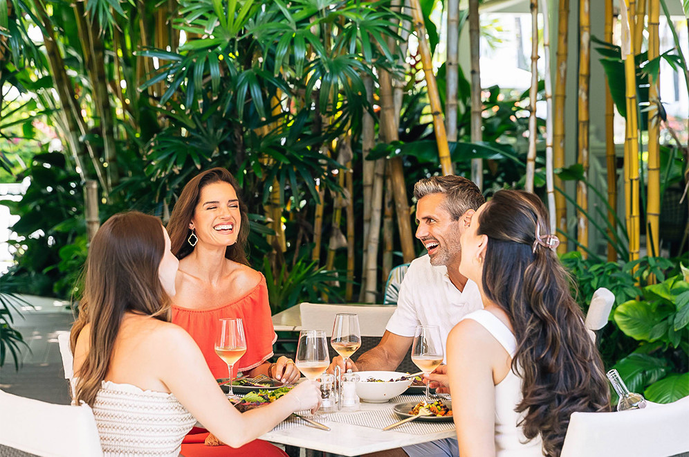 a group of people sitting at a table