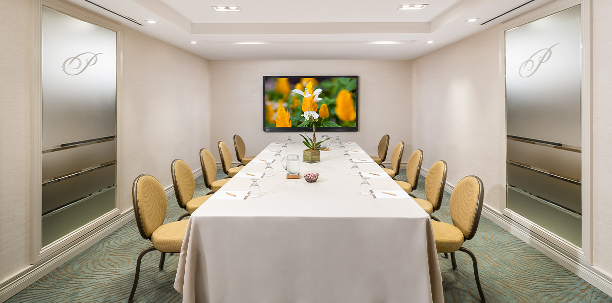 a room with a table and chairs