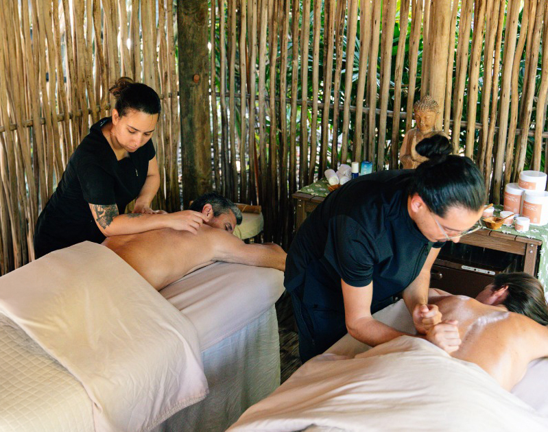 a group of people getting a massage