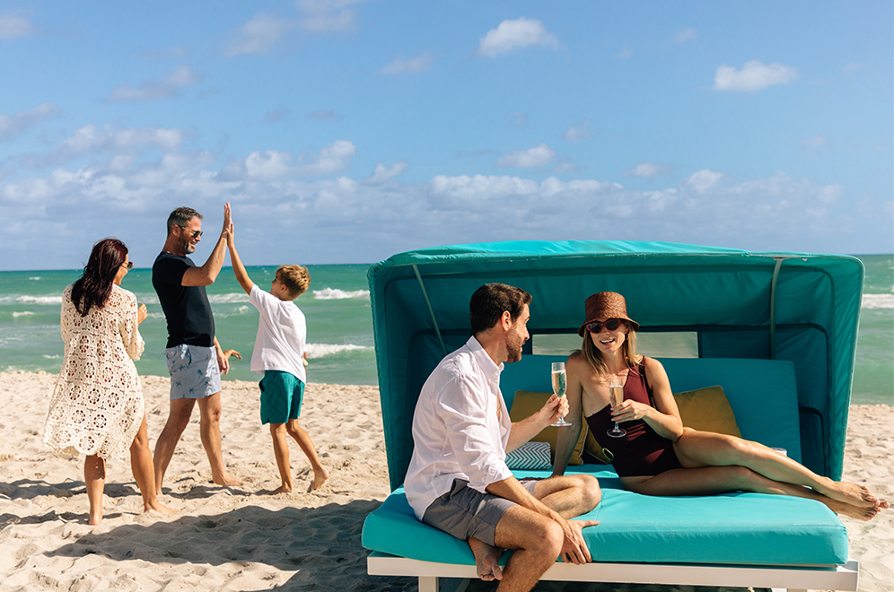 a group of people on a beach