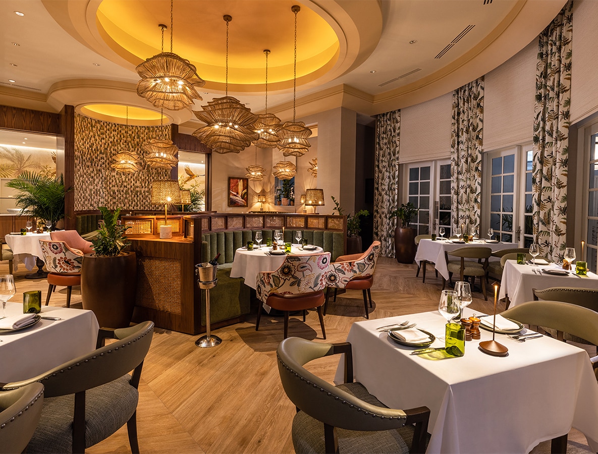 a restaurant with tables and chairs