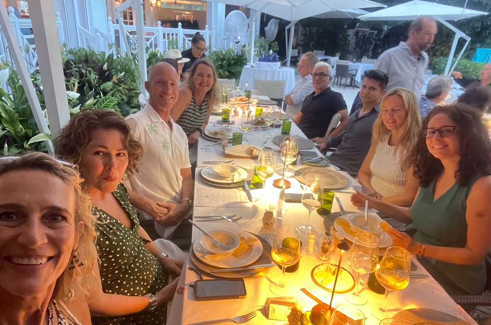a group of people sitting at a table