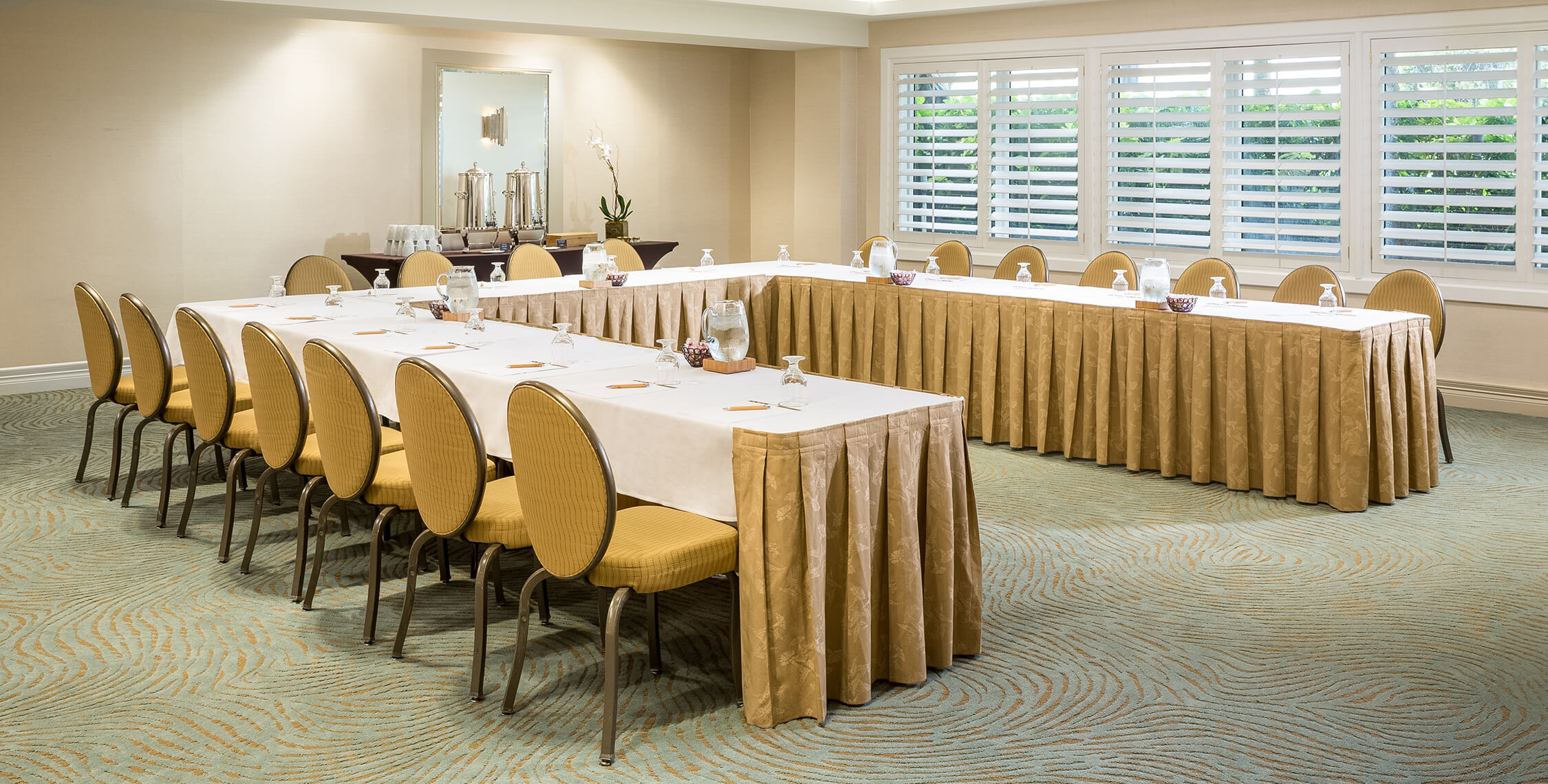 a room with tables and chairs