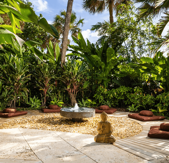 a statue in a garden