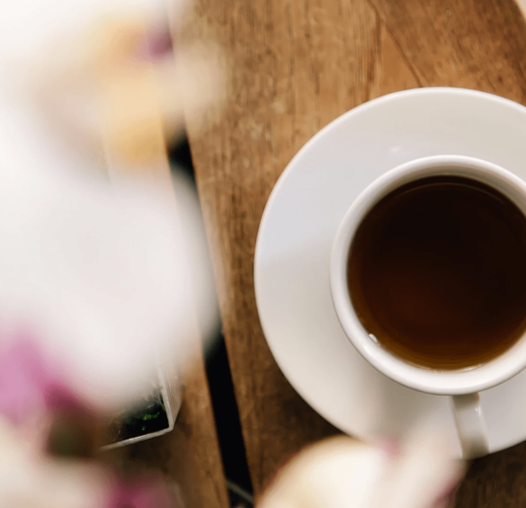 a cup of coffee on a saucer
