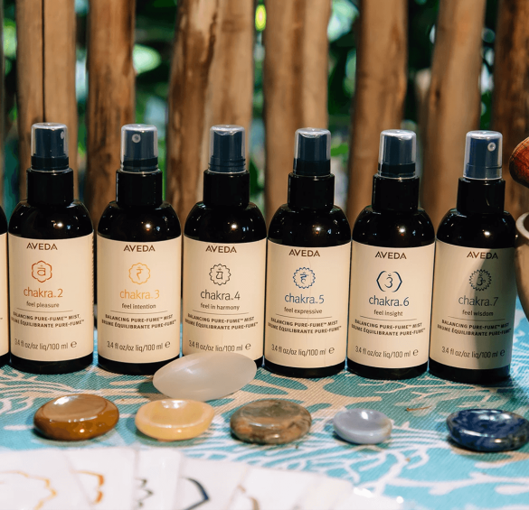a group of bottles of hair spray