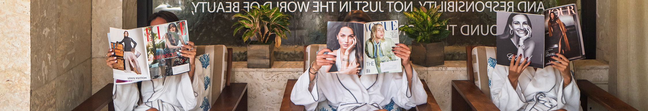 a woman reading a magazine
