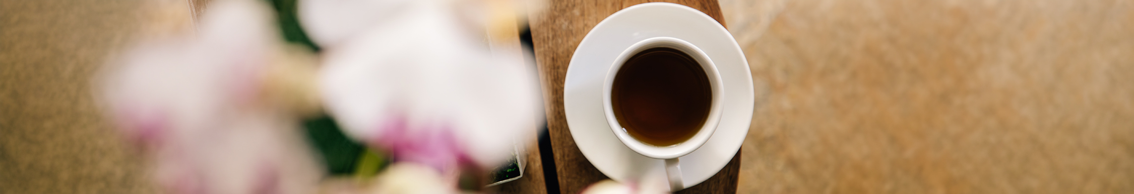 a cup of coffee on a saucer