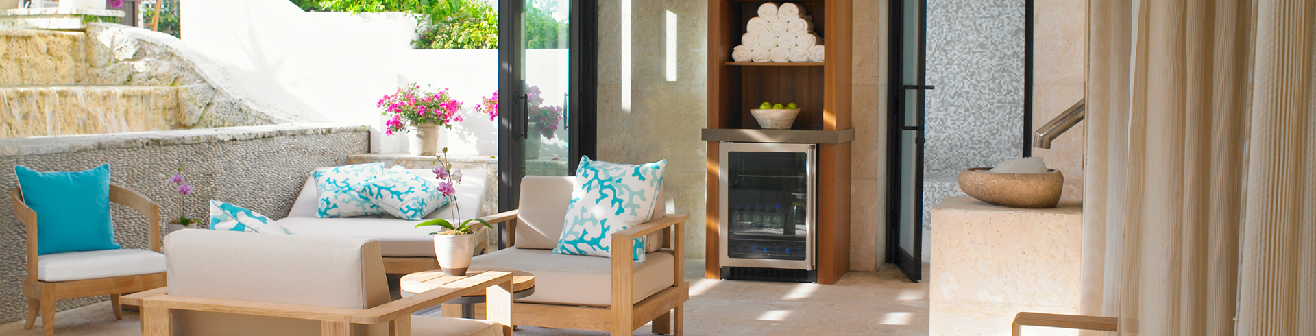a room with a chair and a refrigerator