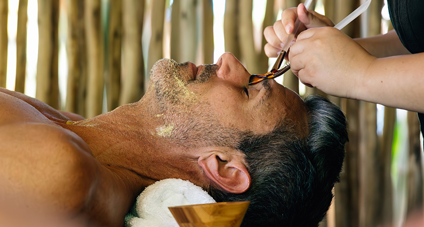 a man getting facial massage