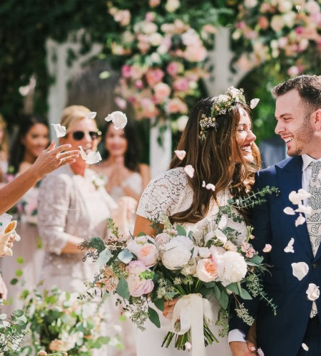 a man and woman in wedding attire