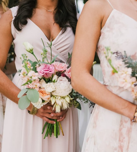 a woman holding flowers in her hands