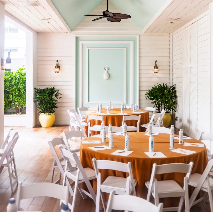 a room with tables and chairs