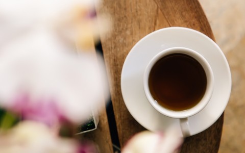 a cup of coffee on a saucer