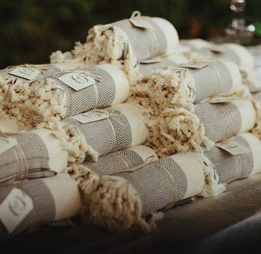 a stack of blankets on a table